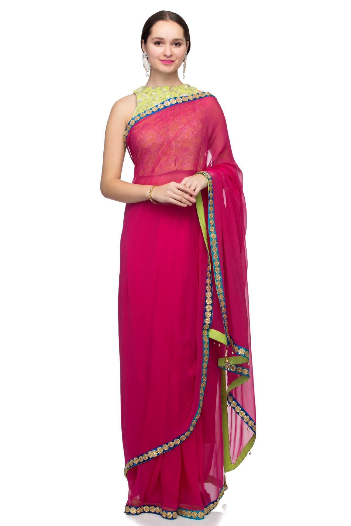 Bright pink georgette designer saree features intricate embroidered border