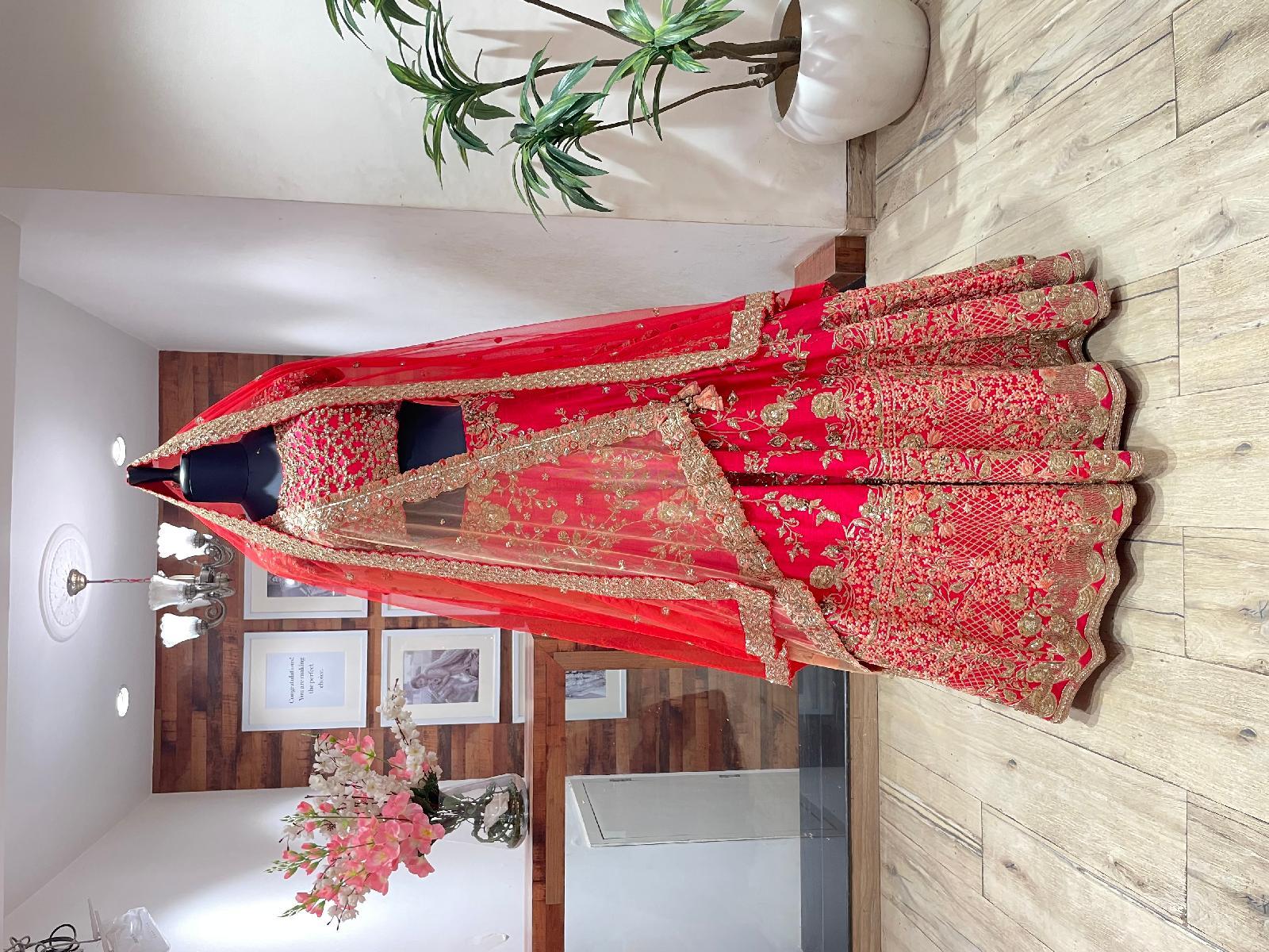 Coral Red Coral Crush Bridal Lehenga by Dolly J for rent online FLYROBE