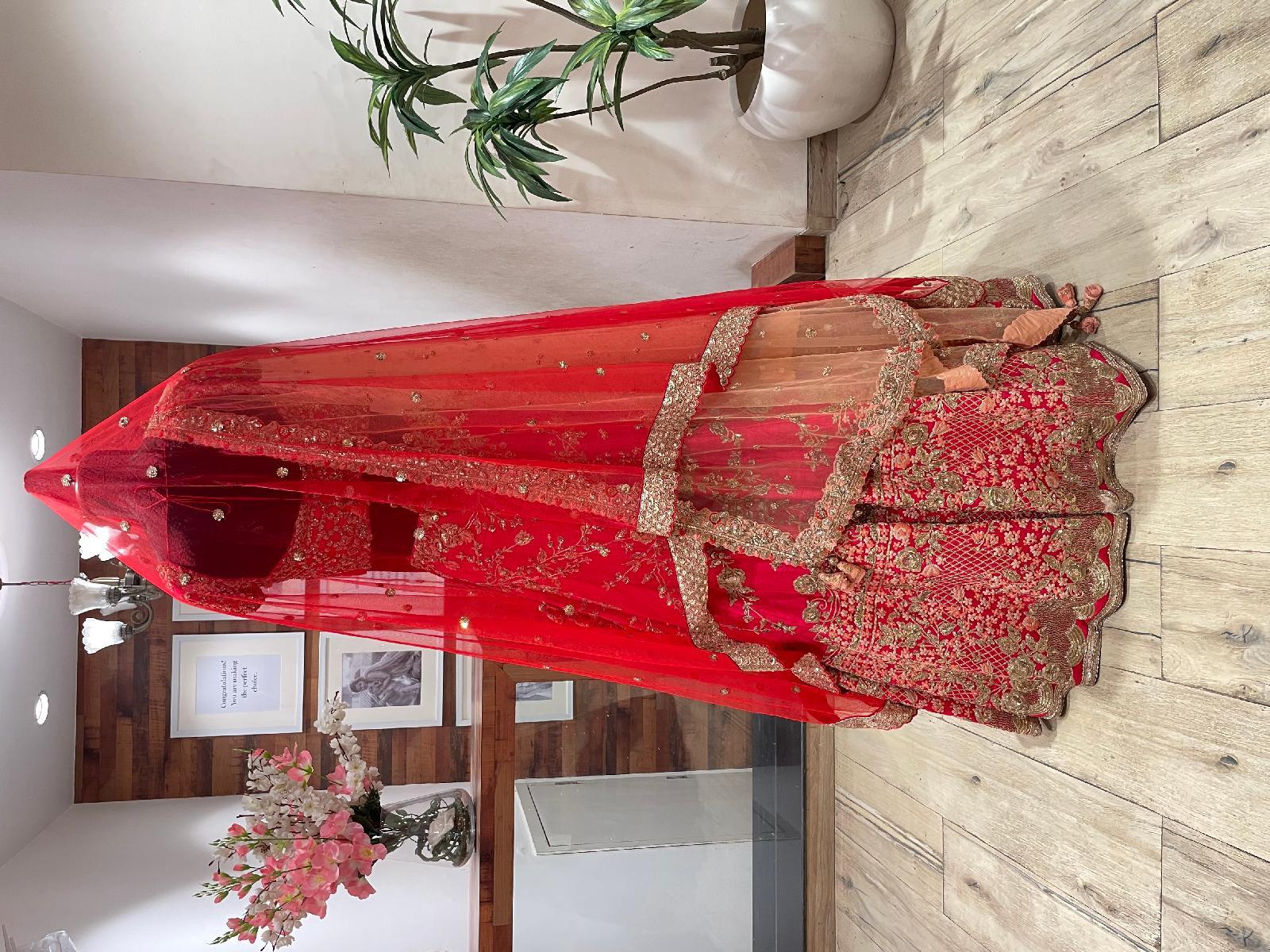 Coral Red Coral Crush Bridal Lehenga by Dolly J for rent online FLYROBE
