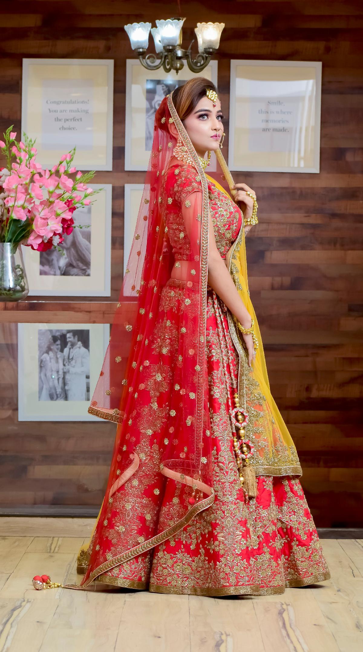This fierce pink and mustard yellow Bridal lehenga is a must have. The  lehenga has a green pop of colour and a intricately woven border.… |  Instagram