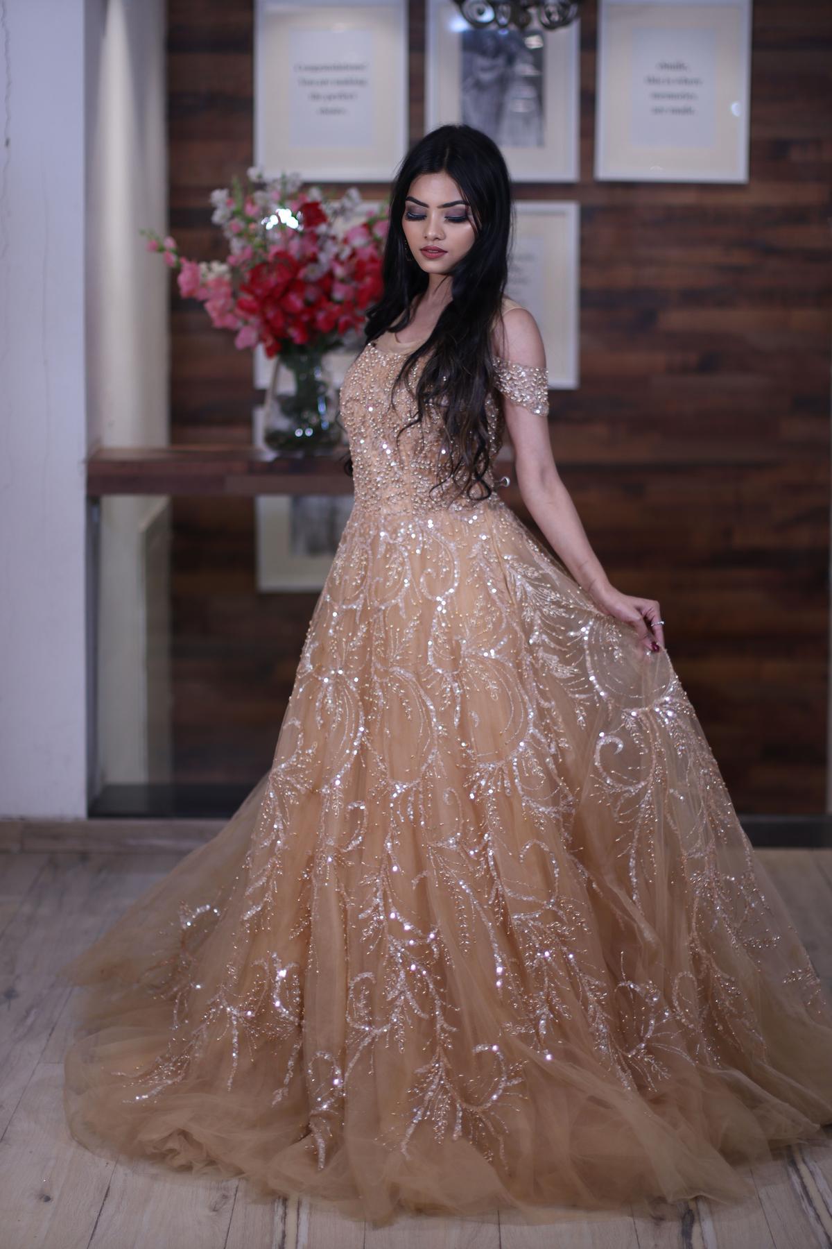 Sizzle and shine in this glorious golden gown Buy Gown online   httpwwwaishwaryadesignstudioco  Anarkali dress pattern Designer  gowns Casual dress outfits
