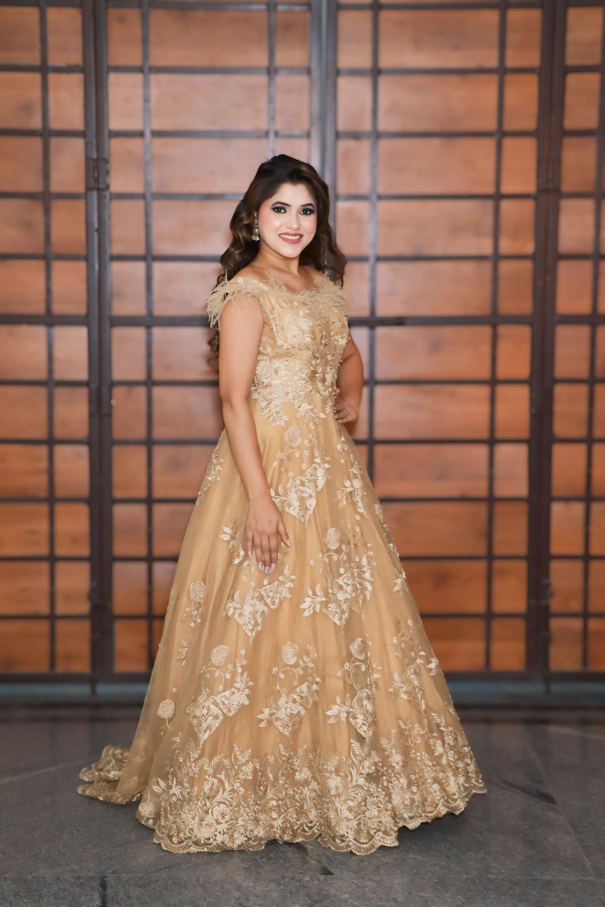 Golden Heavy Embroidered Golden Tail Gown by Ajara By Aditi Kumar for rent online | FLYROBE Golden Heavy Embroidered Golden Tail Gown by Ajara By Aditi Kumar for rent online | FLYROBE